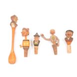 Collection of carved wood novelty bottle stoppers