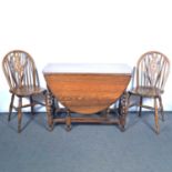 Oak gateleg table and four beechwood chairs