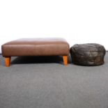 Two contemporary leather footstools