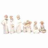 Five Nao figurines and one Lladro group