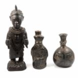 Carved African hardwood Oni Ife statue; and two African burnished earthenware vessels.