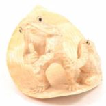 Japanese ivory okimono, Meiji period, carved as two toads on a leaf
