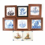 Collection of Delft tiles and a vase