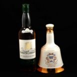 House of Commons 12 Year Old No. 1 Scotch Whisky, and Bells Whisky royal commemorative decanter.