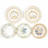 Pair of French faience plates, another faience plate, and two maiolica plates