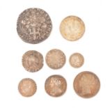 Eight English and European silver coins from 16th to 19th century.