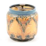 William Moorcroft for Macintyre & Co, a Florian Cornflower tobacco jar and cover, circa 1900.