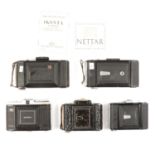 Five Zeiss Ikon vintage cameras, all with folding bellows, various models.