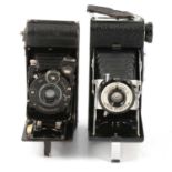 Nine vintage folding cameras, including Tea; King Penguin; but mostly Kodak.
