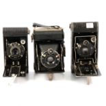 Ten vintage folding cameras, including Thagee; Kodak etc.