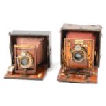 Two folding plate cameras, 'The Sanderson Camera' and 'Unicum'.