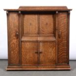 Singer oak cabinet treadle sewing machine.