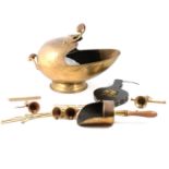 Brass fan fireguard, coal scuttles, and other metalware.