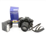 Canon EOS RT SLR camera and accessories, flash and accessories.