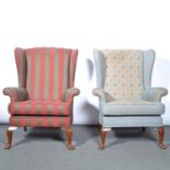 Two wing-back armchairs