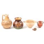 Three pieces of antique pottery, probably Etruscan, and a pottery vase,