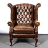 Chesterfield type settee, single chair and wing back chair,