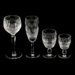Twenty-four Waterford Crystal Colleen pattern glasses.