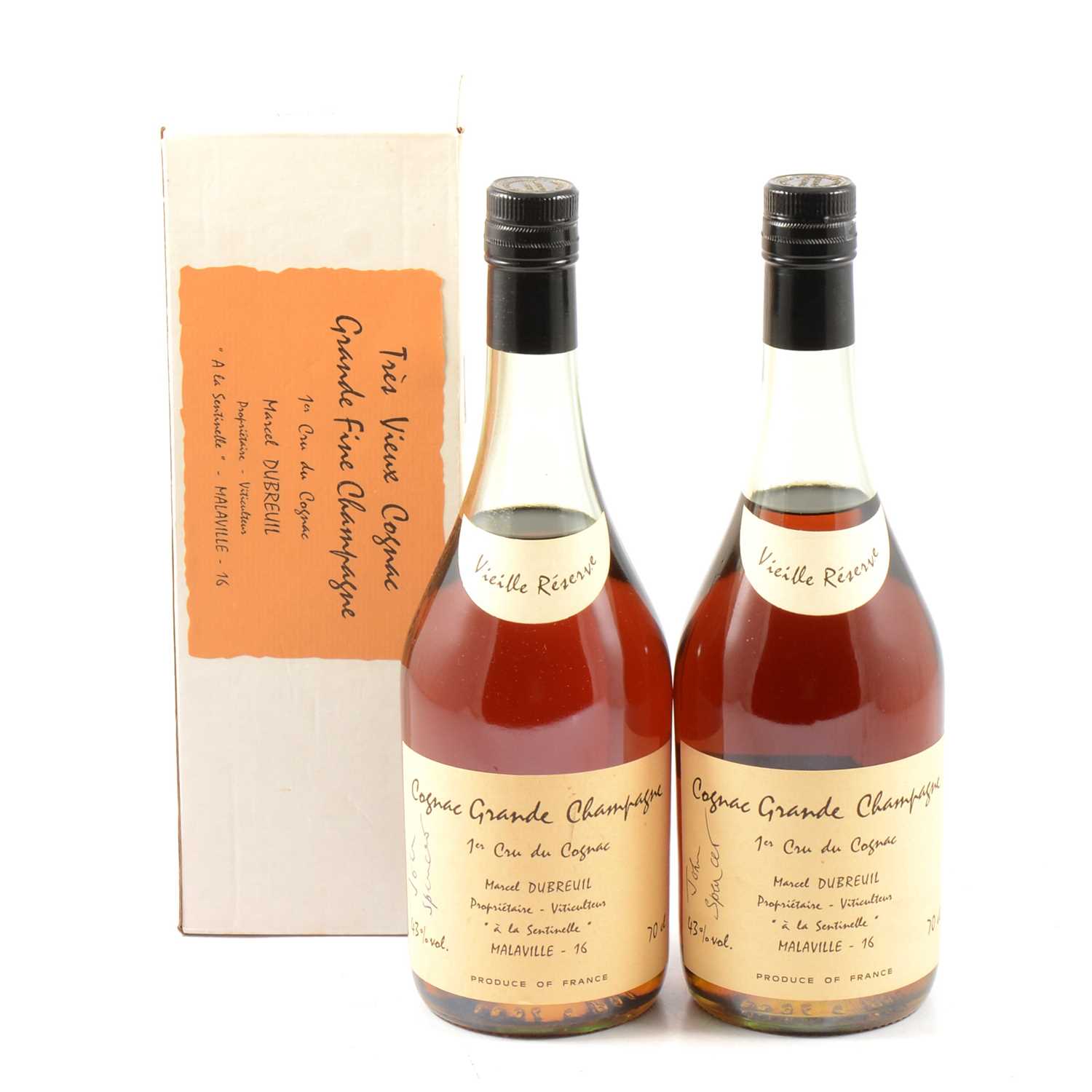Two bottles of Cognac, both labels signed by John Spencer.