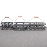 Three metal bottle carriers,