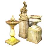 Garden ornaments; urn on a plinth, nymph and a bird bath.