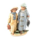 Lladro "Away to School" figural group.