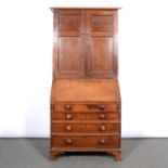 George III oak bureau bookcase,