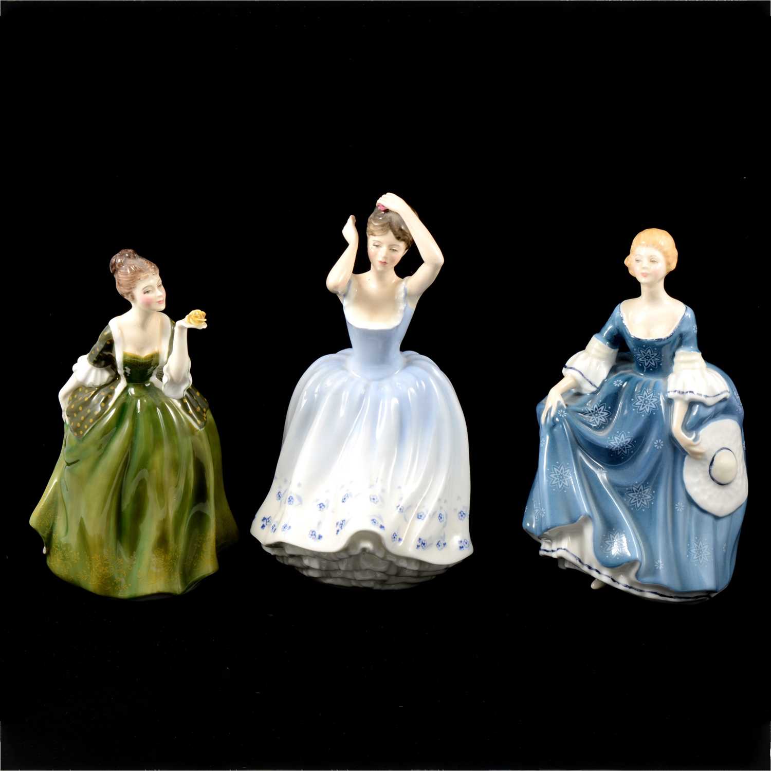 Five Royal Doulton ladies.