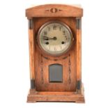 Edwardian oak case mantel clock, and another oak cased clock