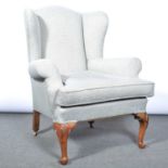 Wing-back easy chair