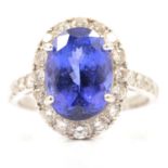 A tanzanite and diamond cluster ring.