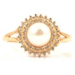 A cultured pearl and diamond dress ring.