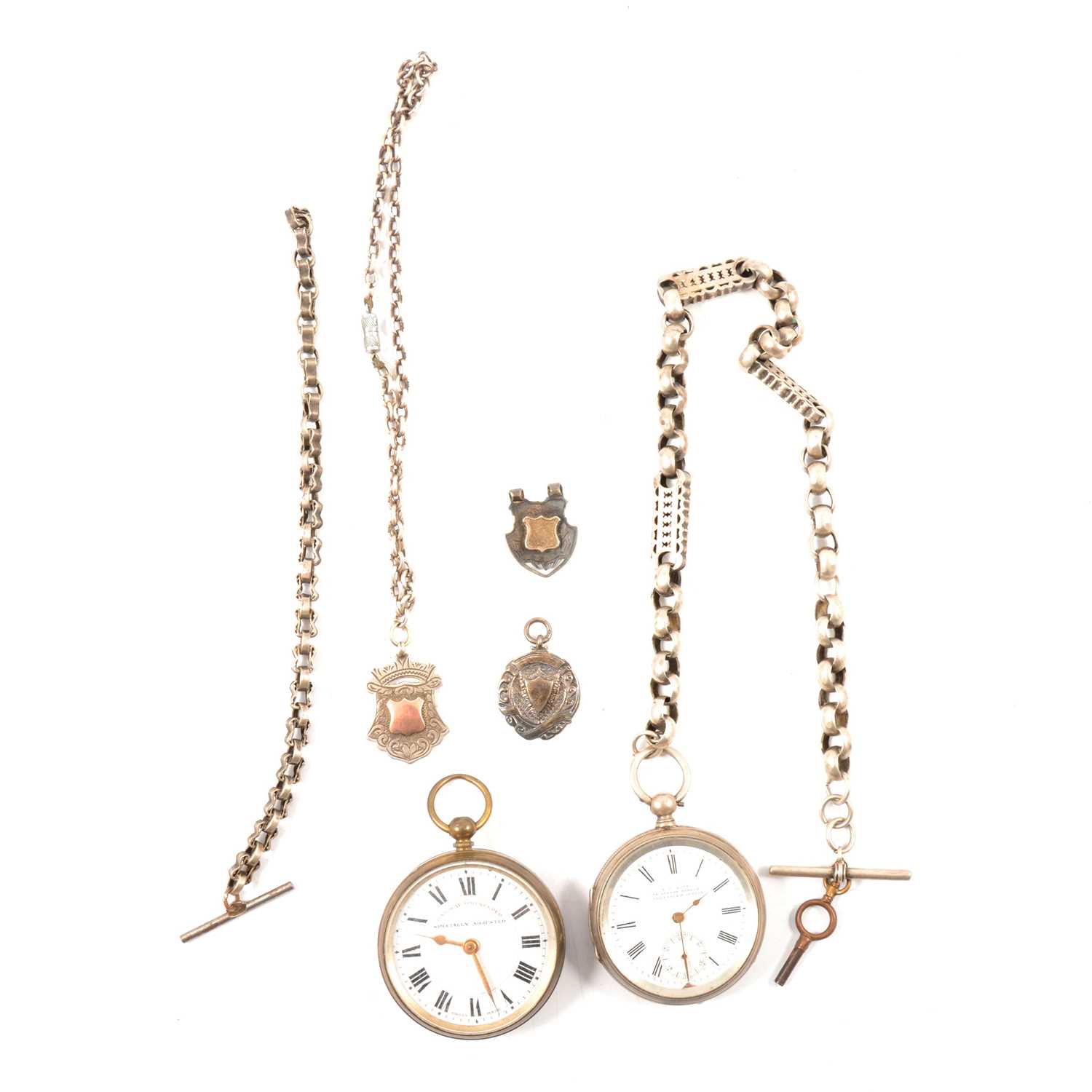 Two pocket watches, Albert watch chains and fobs.