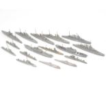 Lead model toy ships, sixteen mostly military boats including two submarines.