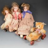 Three early 20th-century bisque head dolls and a Stieff