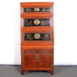 Chinese hardwood and lacquered sectional cupboard