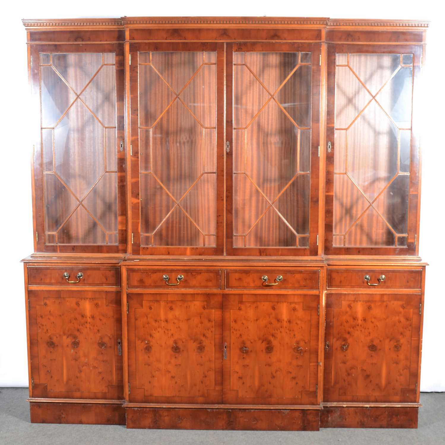 Reproduction yew wood breakfront bookcase