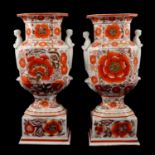 Pair of French porcelain urn shaped vases,