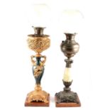 Two oil lamps,