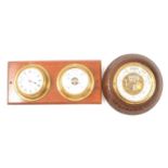 Edwardian walnut cased aneroid barometer, diameter 22cm; and a ship's clock and barometer set, on