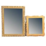 Two gilt-framed mirrors and a mahagony mirror