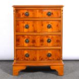 Small reproduction yew veneered chest of drawers