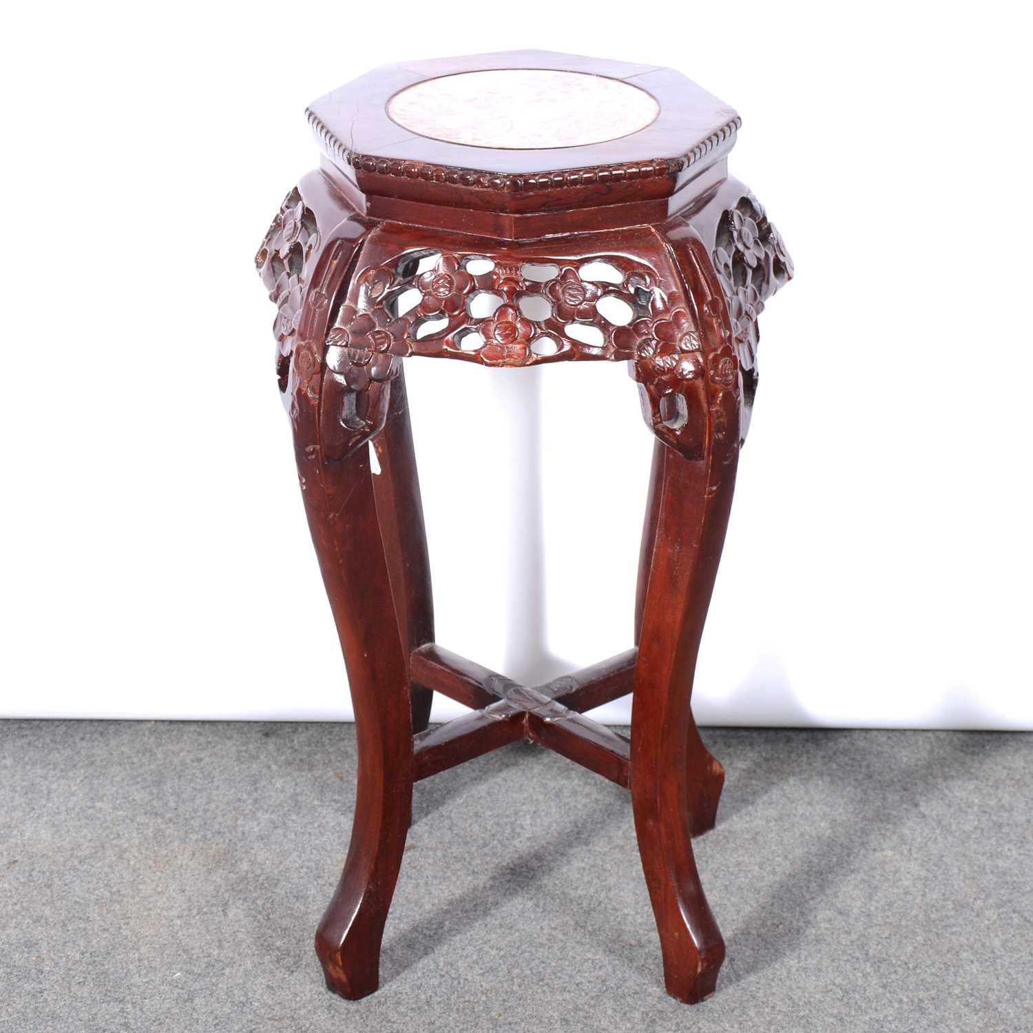 Chinese carved wood jardiniere stand with marble inset octagonal top,