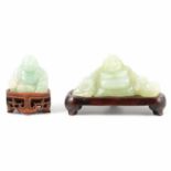 Two Chinese carved jadeite models, Hotei, on stands