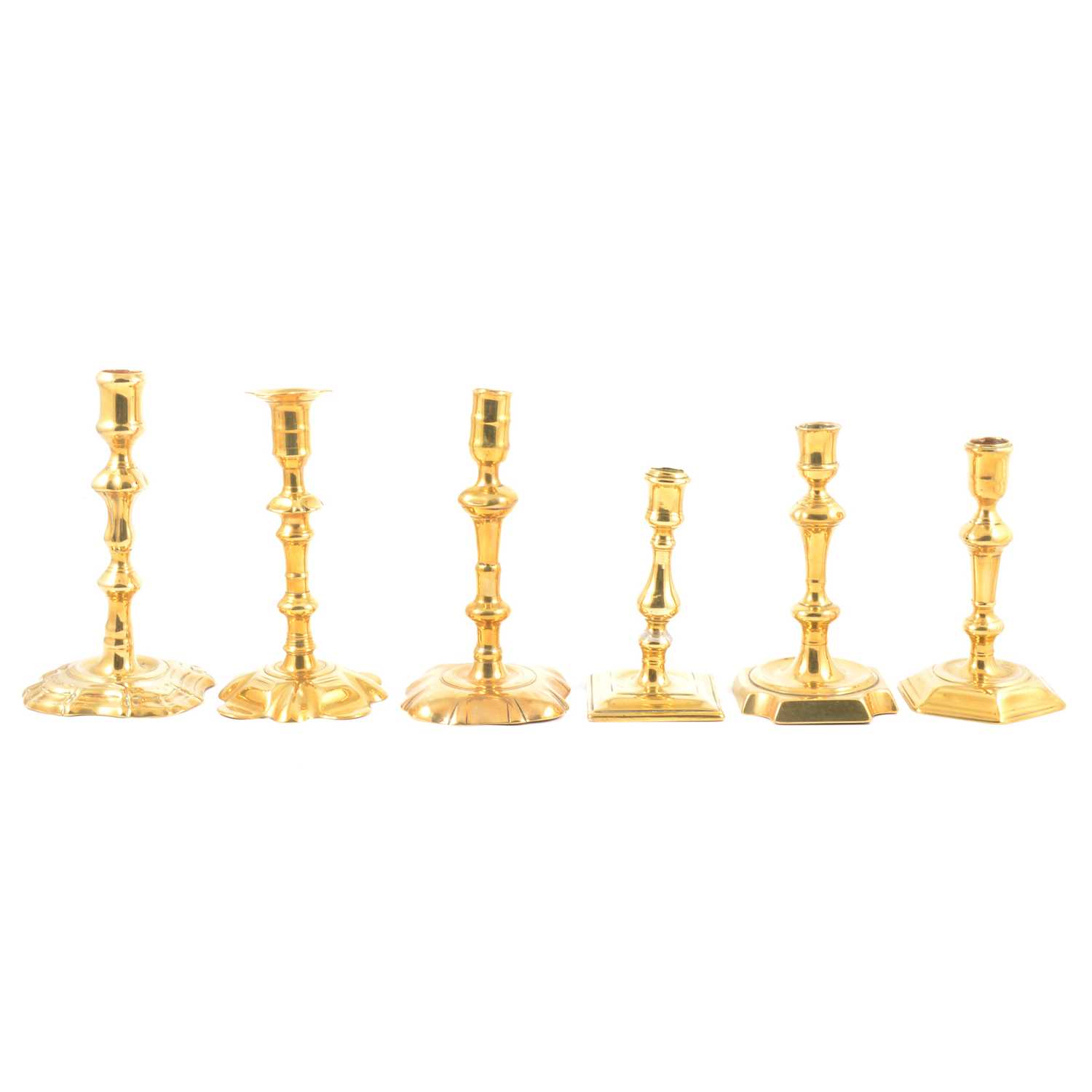 Six brass candlesticks