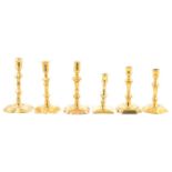 Six brass candlesticks