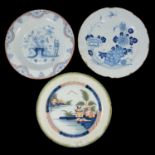 An English delft basin, 18th century, and two English delft plates