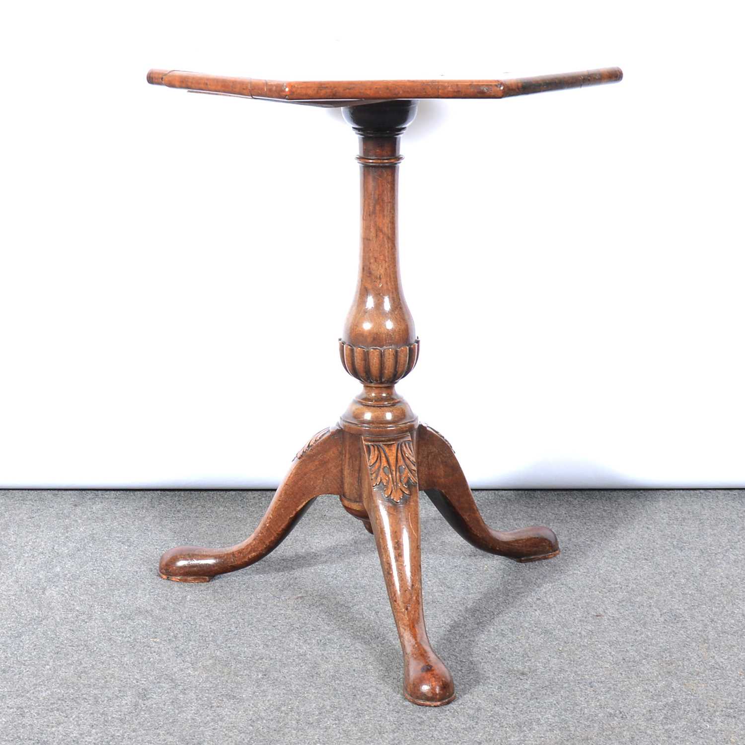 A walnut and laburnum pedestal table