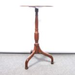 A mahogany pedestal table