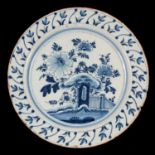 An English delft blue and white charger